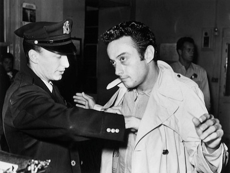 October 4, 1961 - San Francisco, CA. Lenny Bruce being booked  by the San Francisco Police after his arrest for obscenity at the Jazz Workshop.